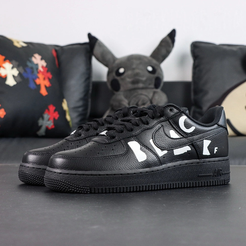 BLACK Comme des Garcons x Air Force 1 Low Retro Black - medial side detail