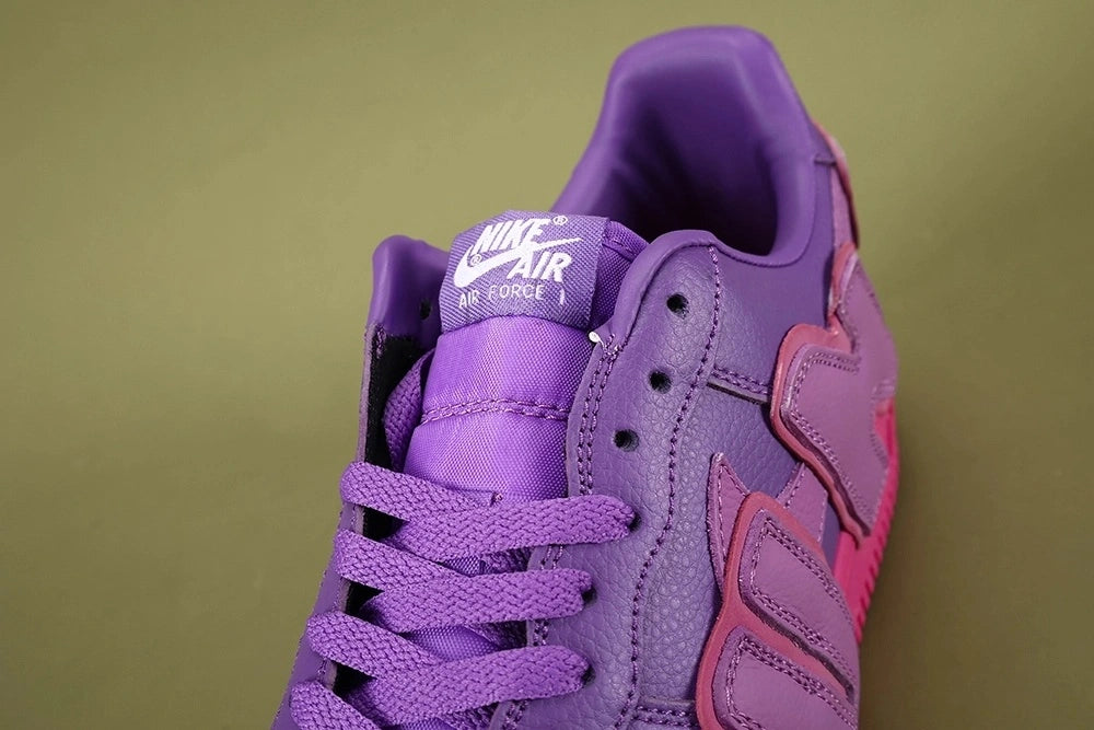 Nike x CPFM Air Force 1 Low Premium Fuchsia Dream - pair lifestyle side