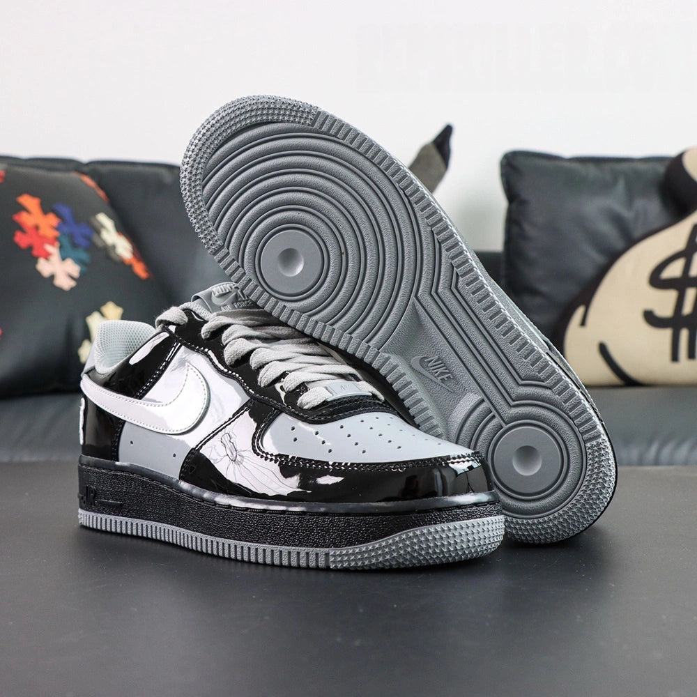 Central Cee x Air Force 1 Low Black White Smoke Grey 2026 - heel rear pair with Pikachu