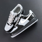 Central Cee x Air Force 1 Low Black White Smoke Grey 2026 - toe box AF1 lace tag