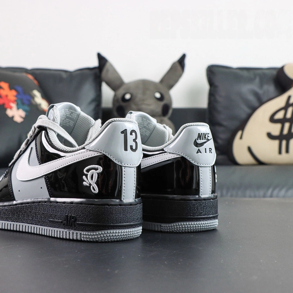 Central Cee x Air Force 1 Low Black White Smoke Grey 2026 - toe box patent leather close up