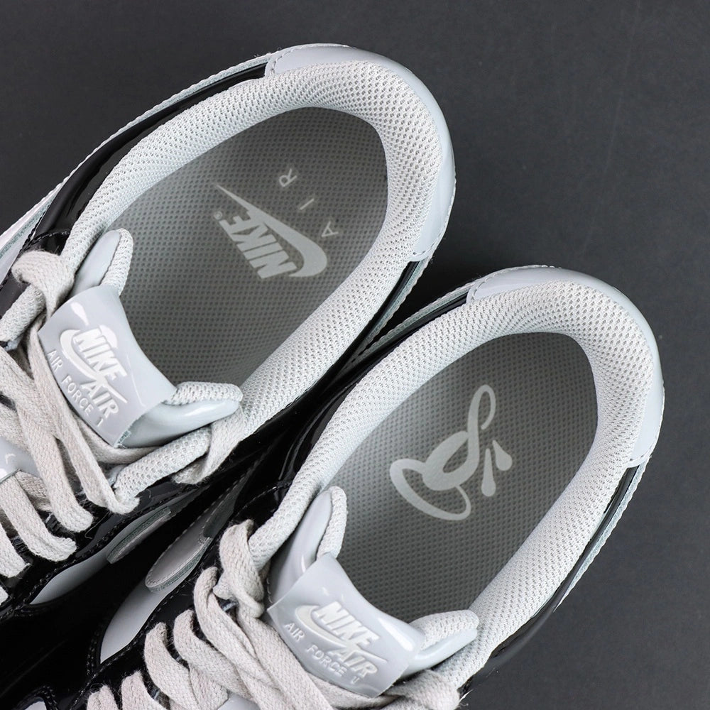 Central Cee x Air Force 1 Low Black White Smoke Grey 2026 - lateral side signature