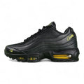 Corteiz x Air Max 95 SP Honey Blacks - Lateral Side View on White Background Showing Full Black Quilted Leather Upper Gold Corteiz Script and Volt Swoosh