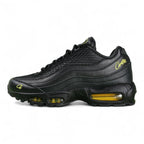 Corteiz x Air Max 95 SP Honey Blacks - Lateral Side View on White Background Showing Full Black Quilted Leather Upper Gold Corteiz Script and Volt Swoosh