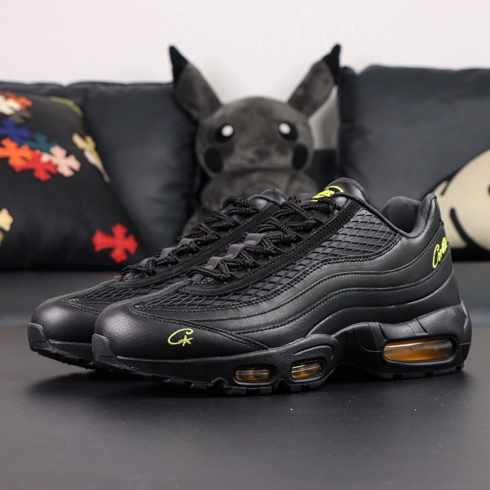 Corteiz x Air Max 95 SP Honey Blacks - Pair with Custom Corteiz Co-Branded Nike Shoebox on Dark Background
