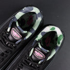 Corteiz x Air Max 95 SP Rules the World Pink Beam - Toe Box Close Up Showing Diamond Quilted Black Leather and Hot Pink Corteiz Script on Midsole on Dark Background