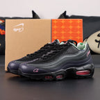 Corteiz x Air Max 95 SP Rules the World Pink Beam - Heel Pair Rear View Showing Tonal Nike Air Heel Counter 916079-916 Style Code and Hot Pink Corteiz Script with Pikachu on Sofa