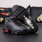 Corteiz x Air Max 95 SP Rules the World Pink Beam - Pair Top Down View Showing Mint Green Camo Collar Lining Tongue Lining and Camo Insole with Pink Air Units on Dark Background