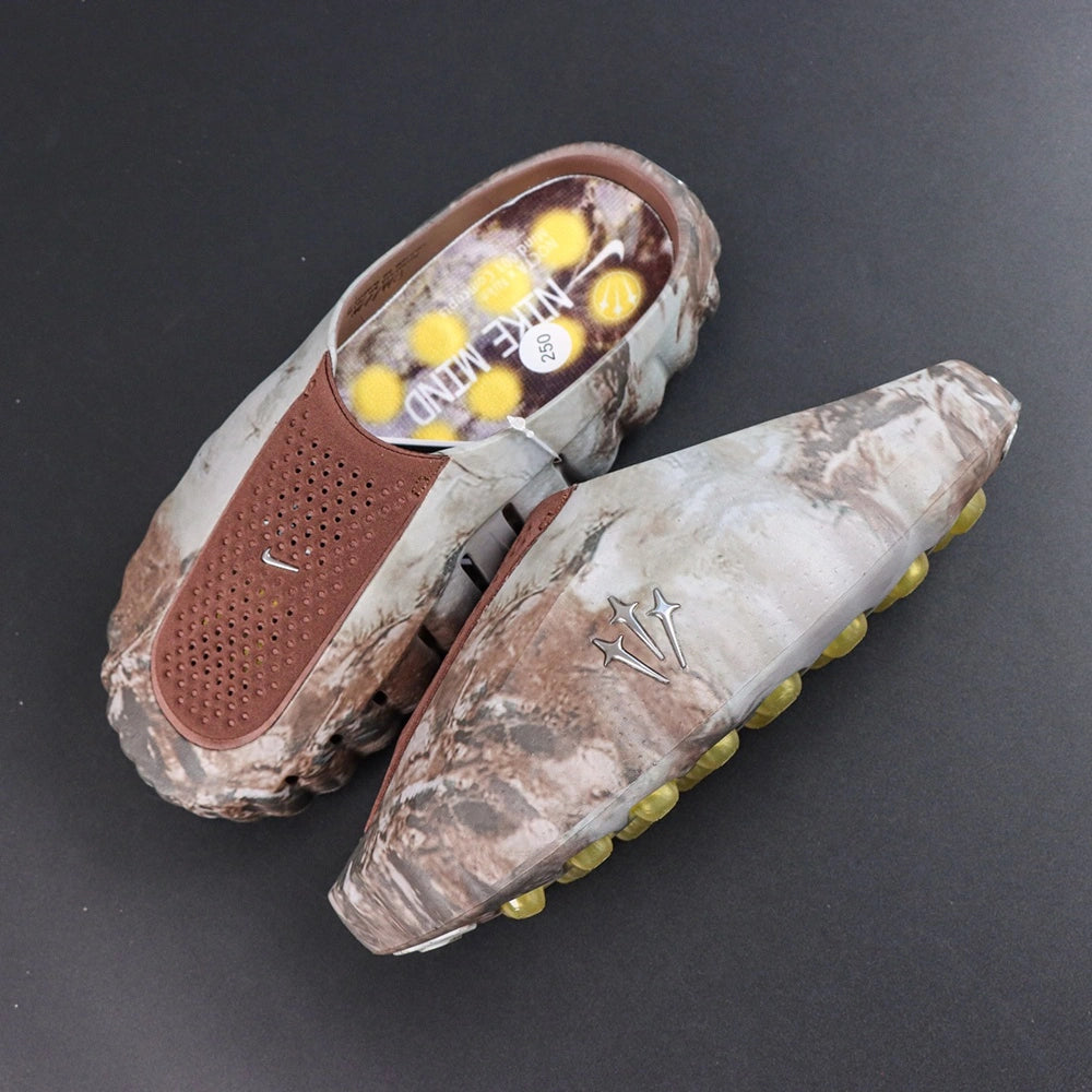 Drake NOCTA x Mind 001 Bronze 2026 - Side low profile