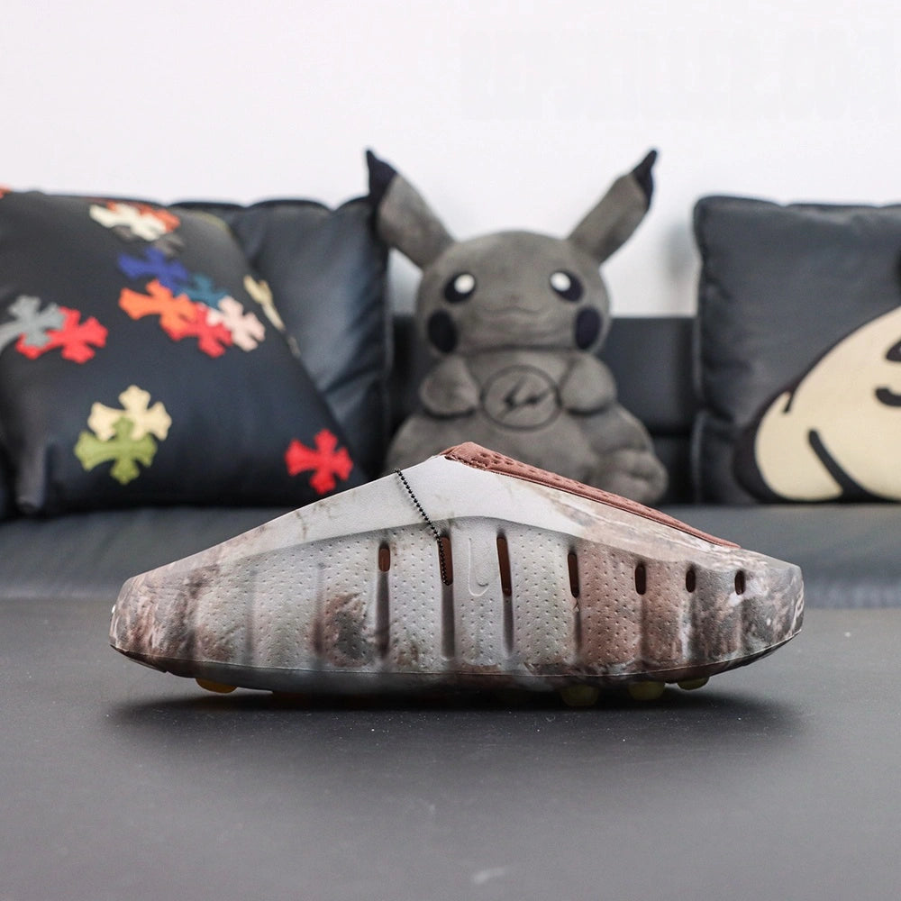 Drake NOCTA x Mind 001 Bronze 2026 - Toe overlay detail
