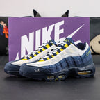 Eric Koston x Nike SB x Air Max 95 Obsidian Speed Yellow 2025 - Medial Side View with Pikachu on Sofa Showing Thai Script Nike Embroidery on Toe Box and Yellow Rope Laces