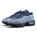 Levis x Air Max 95 OG Obsidian 2025 - Lateral Side View on Dark Background Showing Full Indigo Denim Upper Raw Edge Fraying and Tonal Navy Swoosh