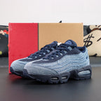 Levis x Air Max 95 OG Obsidian 2025 - Collar Close Up Showing Raw Edge Denim Fraying and Red Fabric Collar Lining on Dark Background