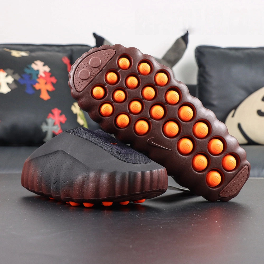 Mind 001 Flyknit Bronze Eclipse 2026 - Heel NK and MIND badges pair