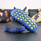 Mind 001 Flyknit Hyper Royal 2026 - Flyknit upper volt Swoosh detail