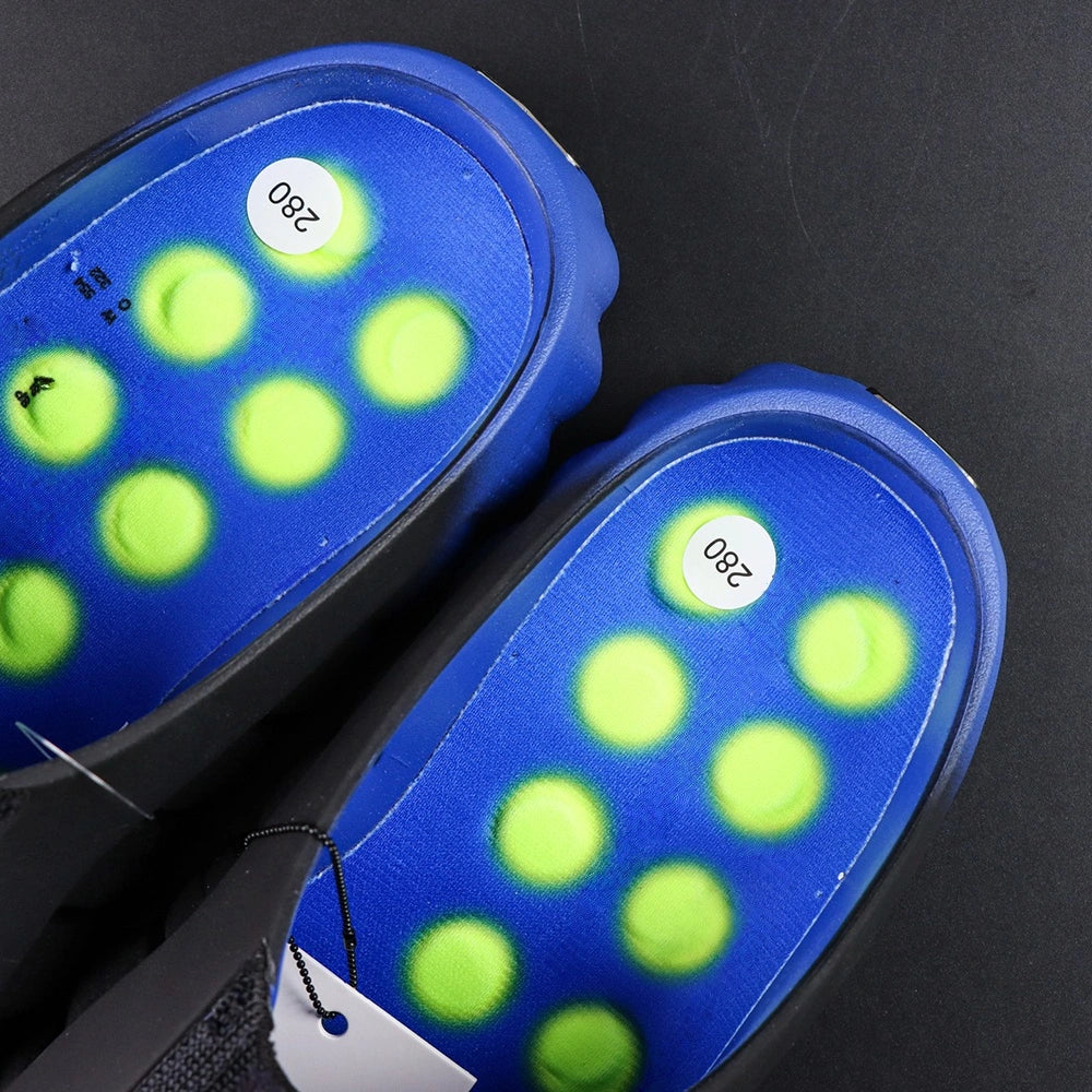 Mind 001 Flyknit Hyper Royal 2026 - Heel NK and MIND badges pair