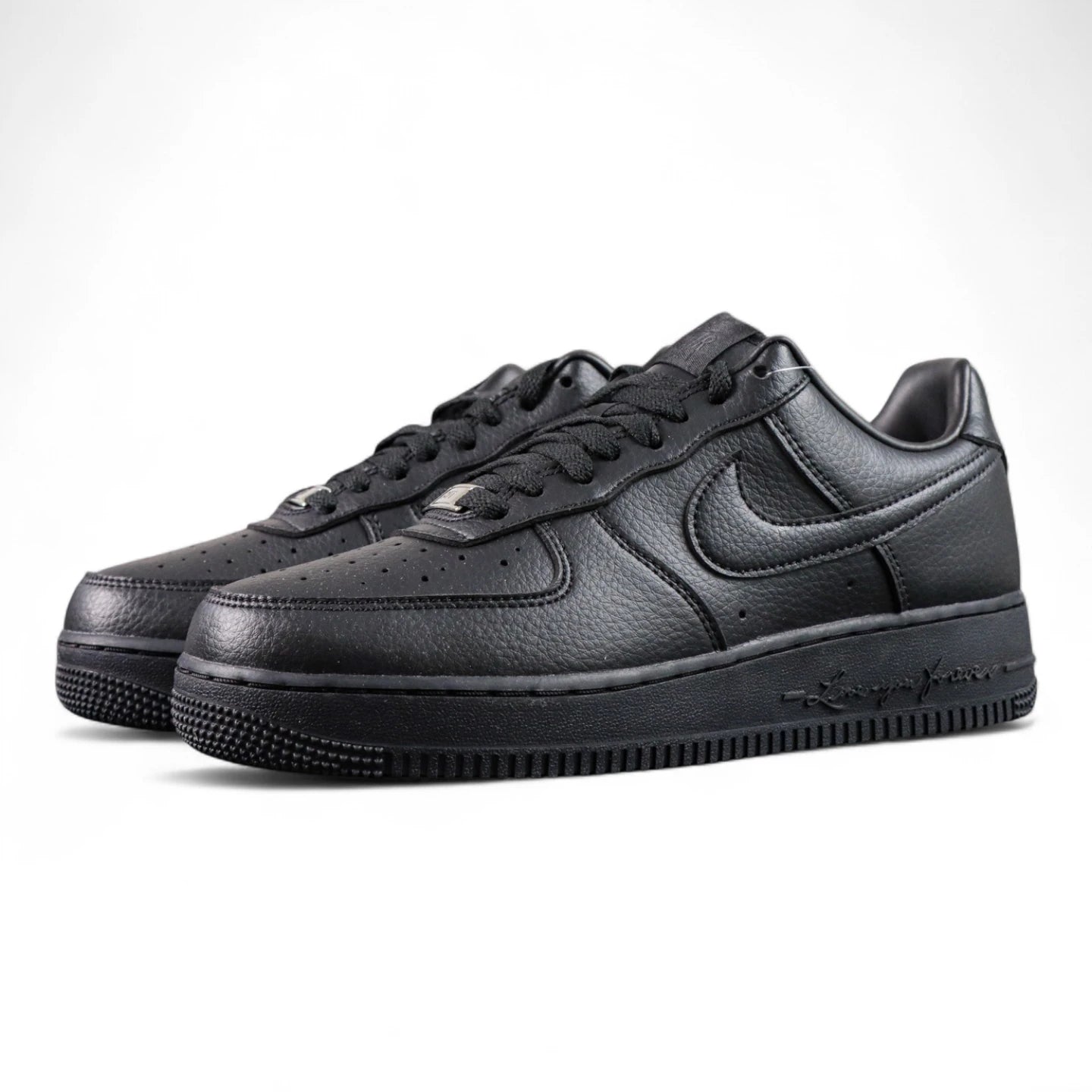 NOCTA x Air Force 1 Low Certified Lover Boy Black - NOCTA insole overhead close up pair