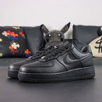NOCTA x Air Force 1 Low Certified Lover Boy Black - toe box AF1 silver dubrae pair close up