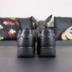 NOCTA x Air Force 1 Low Certified Lover Boy Black - pair with outsole Love you forever midsole script