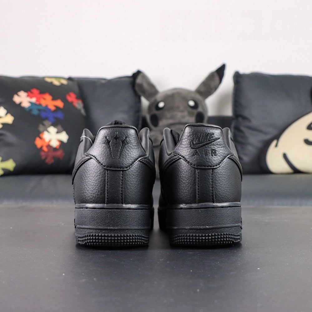 NOCTA x Air Force 1 Low Certified Lover Boy Black - pair with outsole Love you forever midsole script