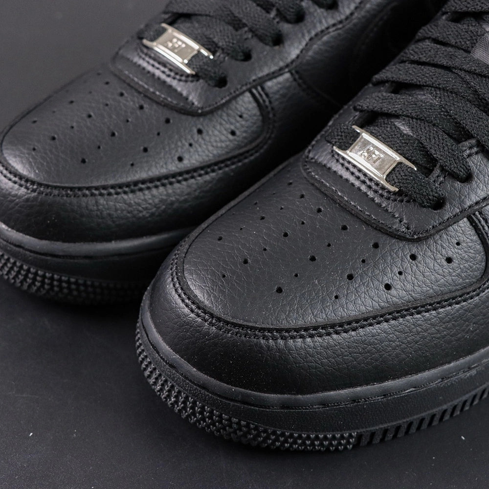 NOCTA x Air Force 1 Low Certified Lover Boy Black - lateral side profile lifestyle Pikachu