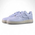 NOCTA x Air Force 1 Low Certified Lover Boy Palest Purple - pair three quarter front lifestyle Pikachu