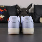 NOCTA x Air Force 1 Low Certified Lover Boy Palest Purple - pair overhead flat lay Love you forever midsole