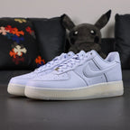 NOCTA x Air Force 1 Low Certified Lover Boy Palest Purple - pair three quarter view icy translucent outsole