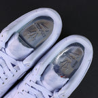 NOCTA x Air Force 1 Low Certified Lover Boy Palest Purple - pair three quarter rear view Pikachu lifestyle