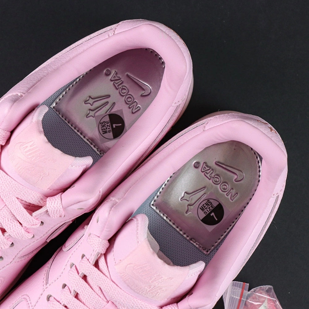 NOCTA x Air Force 1 Low Certified Lover Boy Pink Foam - pair overhead flat lay Love you forever midsole