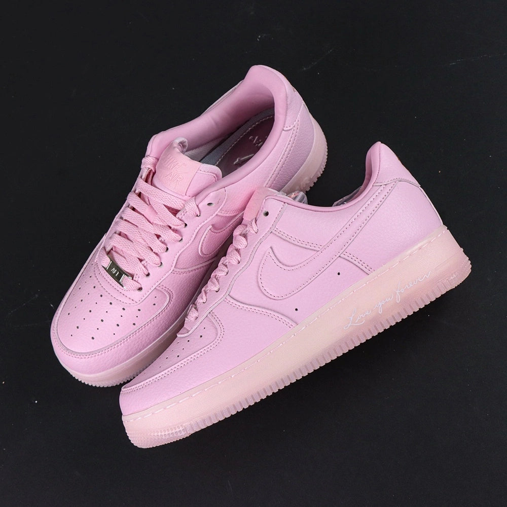 NOCTA x Air Force 1 Low Certified Lover Boy Pink Foam - pair three quarter view Pikachu lifestyle
