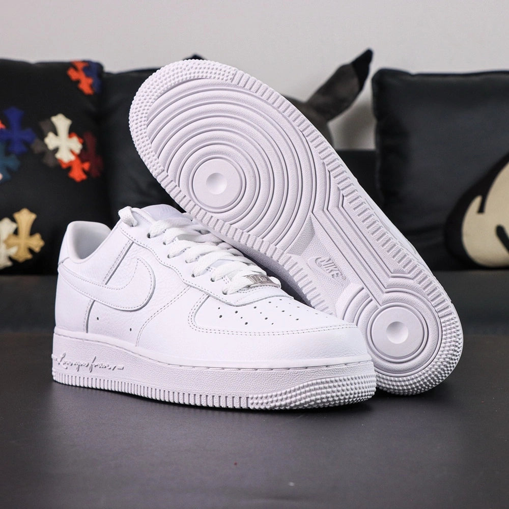 NOCTA x Air Force 1 Low Certified Lover Boy - pair three quarter view lifestyle
