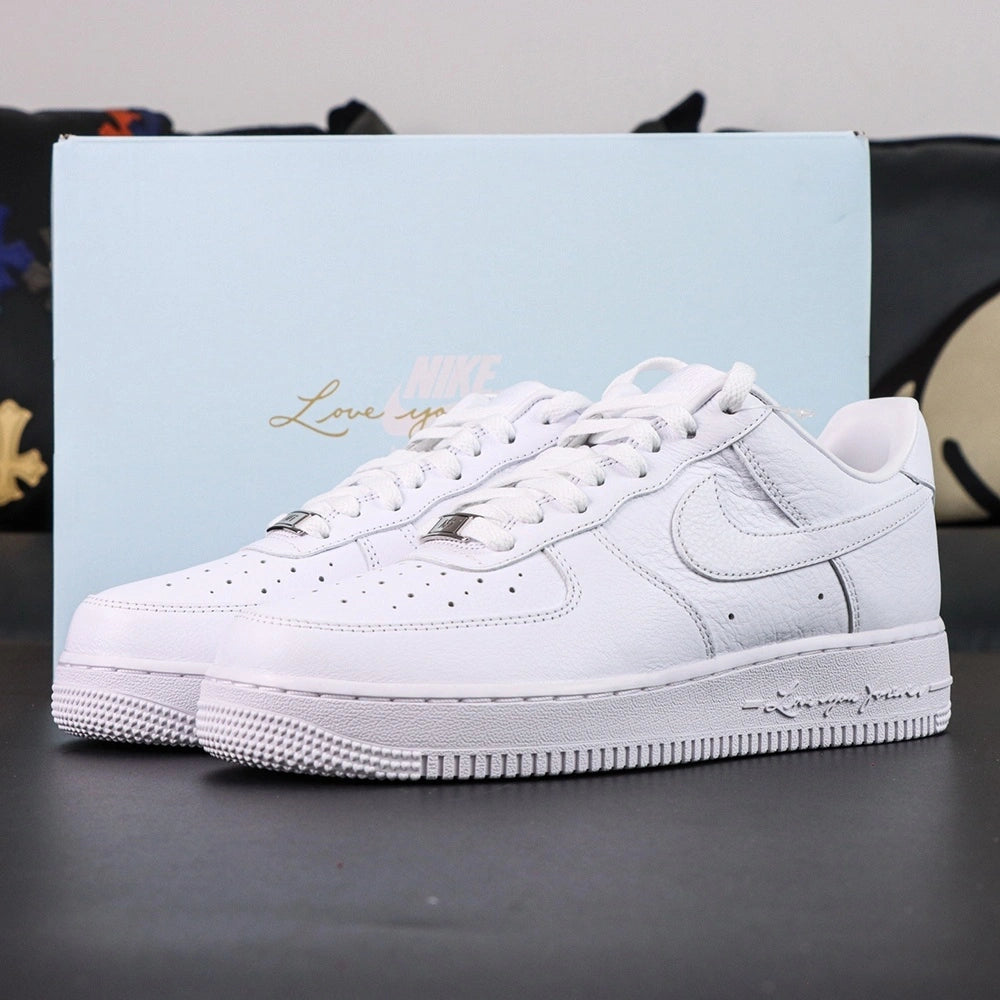 NOCTA x Air Force 1 Low Certified Lover Boy - heel NOCTA trident logo embroidery rear view