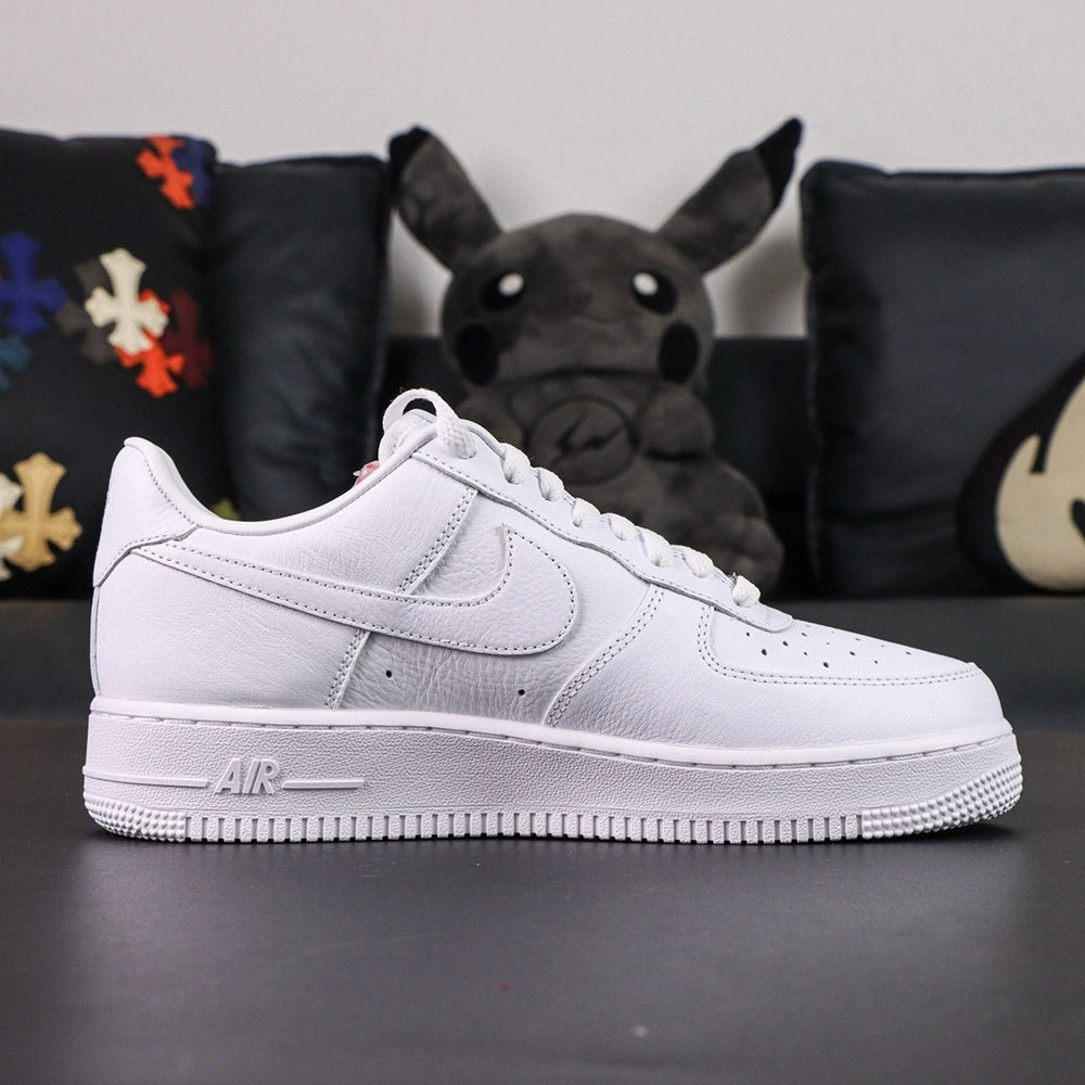 NOCTA x Air Force 1 Low Certified Lover Boy - Drake cursive signature midsole close up