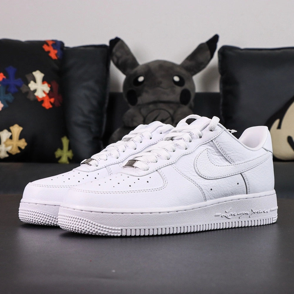 NOCTA x Air Force 1 Low Certified Lover Boy - heel medial NOCTA trident and Nike Air rear view