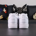 NOCTA x Air Force 1 Low Certified Lover Boy - pair overhead flat lay pink tongue lining