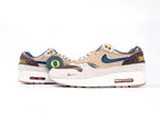 Air Max 1 87 Premium PE University of Oregon - Medial Side View on White Background Showing Perforated Tan Leather Teal Mini Swoosh on Suede and Once A Duck Yellow Embroidered Heel Text