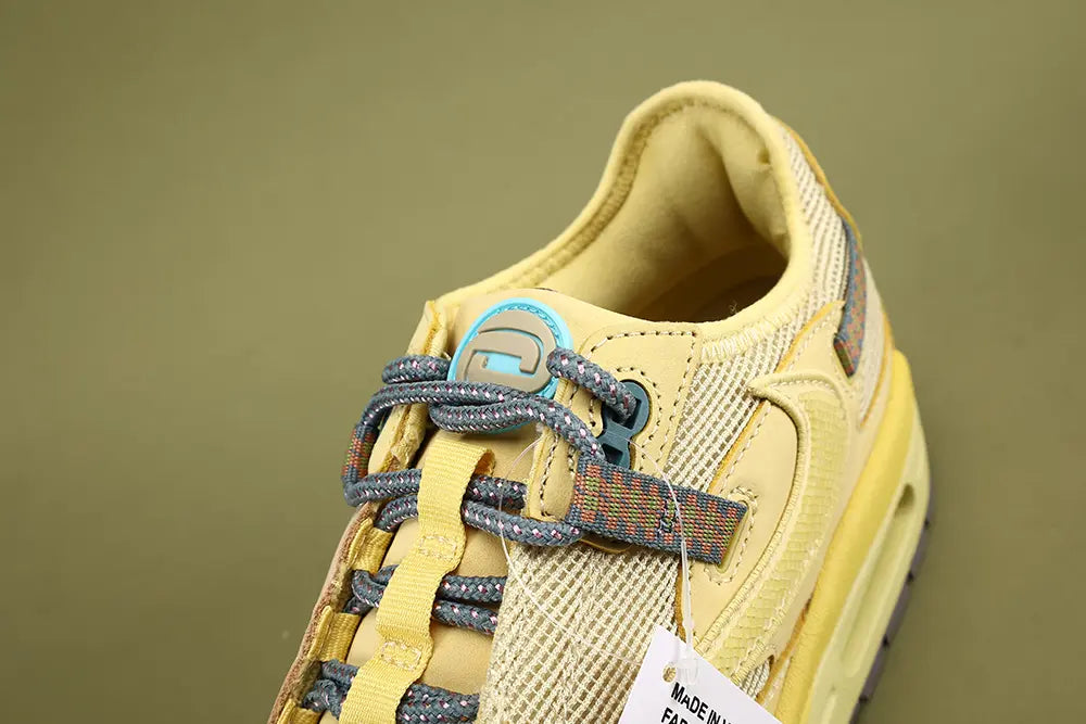 Air Max 1 Cactus Jack Saturn Gold Tea Tree Mist - Shoe Box Label Close Up Showing Style Code DO9392-700 Colorway Saturn Gold Tea Tree Mist Tent and Suggested Retail USD 160