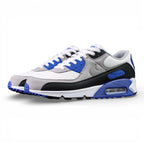 Air Max 90 Hyper Royal 2020 - Pair Top Down View on Dark Background Showing Hyper Royal Blue Insole with White Swoosh and Air Text and White Mesh Tongue with Woven Air Label