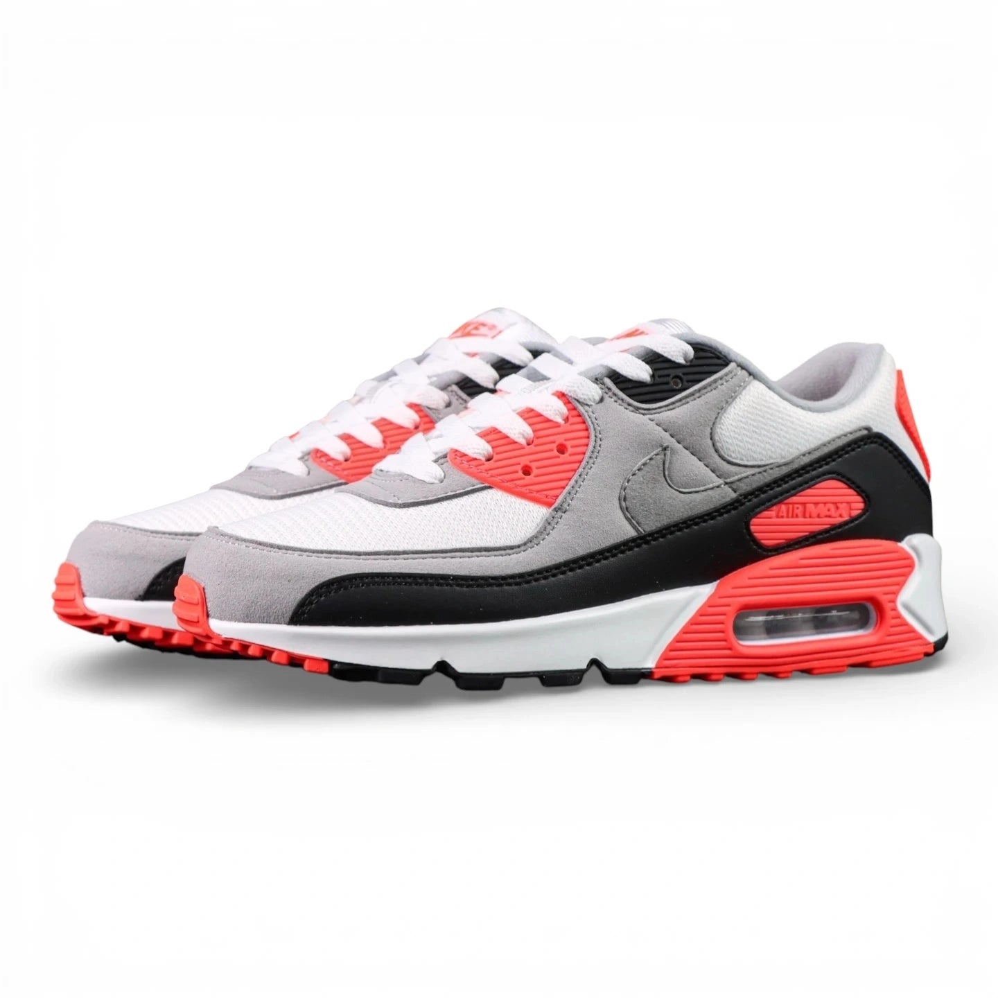 Air Max 90 Infrared 2020 - Lateral Side View with Pikachu on Sofa Showing White Mesh Toe Box Grey Suede Quarter Panel Black Mudguard Infrared Red Corduroy Panel Grey Tonal Swoosh and Red Air Max Midsole Text
