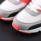 Air Max 90 Infrared 2020 - Pair Top Down View on Dark Background Showing White Mesh Toe Box Grey Suede Swoosh Infrared Red Collar Lining and White Flat Laces