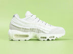 Air Max 95 x Comme des Garçons White - Toe Box Top Down View on Green Background Showing White Suede Mudguard White Mesh Upper and Reflective Grey Lace Dubrae Details