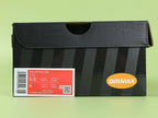 Air Max Dn8 All Black - Heel Close Up on Green Background Showing Silver Circular AIR Badge with Red Dn Accent Black Mesh Collar and Translucent Black Dn8 Air Pods