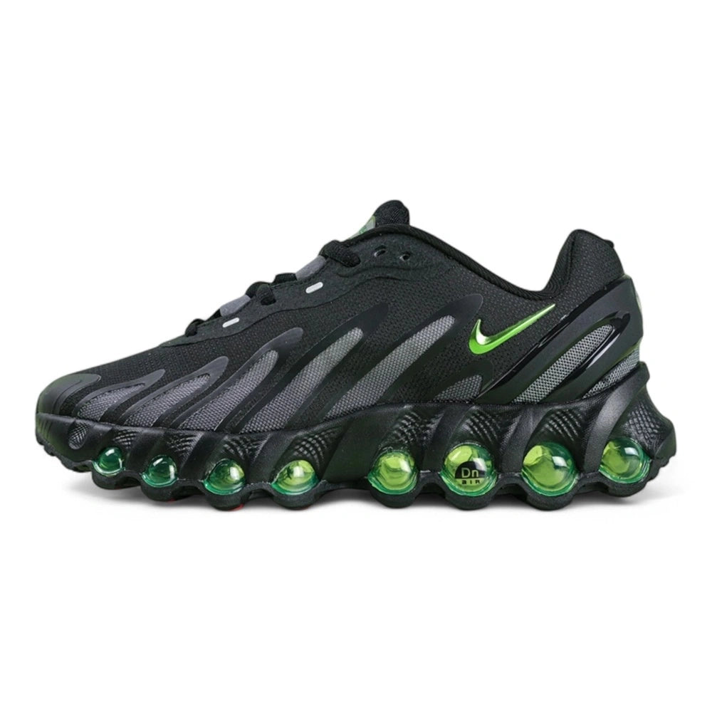 Air Max Dn8 Black Volt - Full Lateral Profile View on White Background Showing Black Upper Grey Hexagonal Mesh Panels Metallic Volt Chrome Swoosh and 8 Volt Green Spherical Dn8 Air Pods on Midsole
