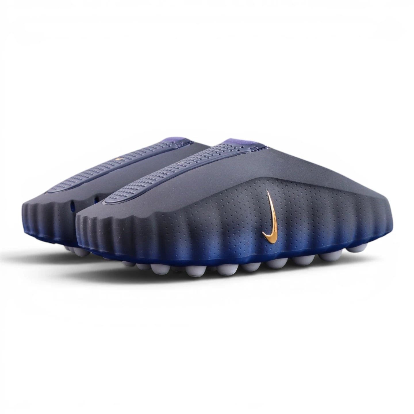 Mind 001 Blackened Blue 2026 - Gold Swoosh perforated upper close-up