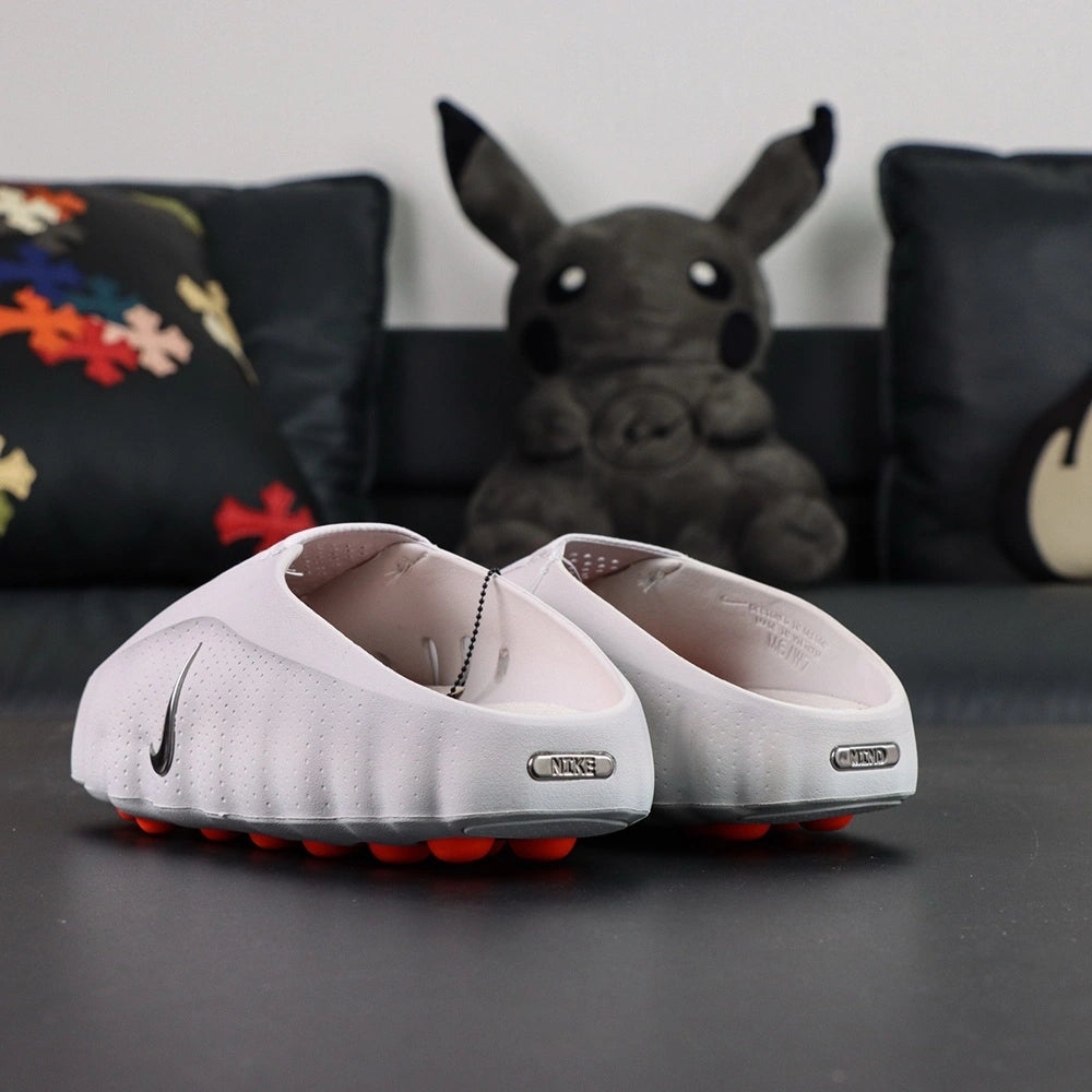 Mind 001 Mule Light Smoke Grey 2026 - Top view pair with silver Swoosh
