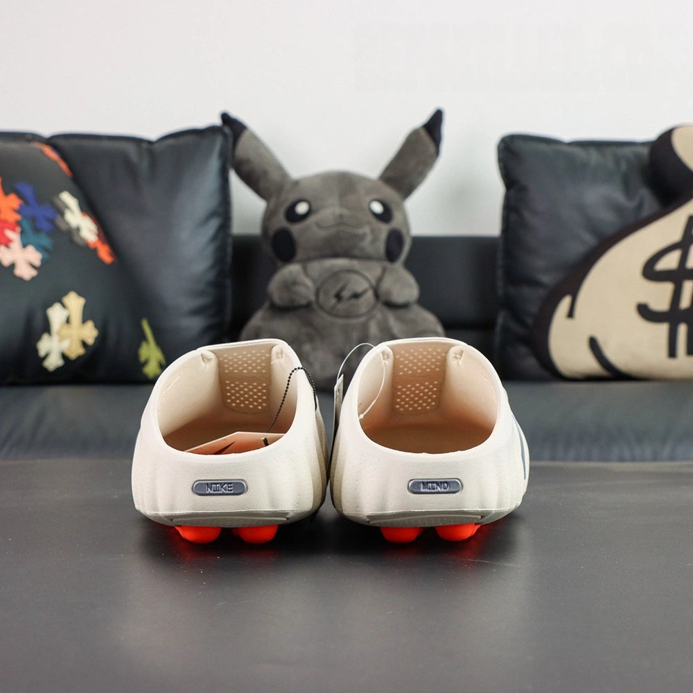 Mind 001 Mule Sail 2026 - Front heel view NK and MIND silver badges pair with Pikachu backdrop
