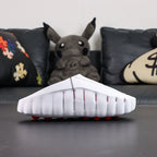 Mind 001 Mule White Speed Red 2026 - Side profile black Swoosh with Pikachu backdrop