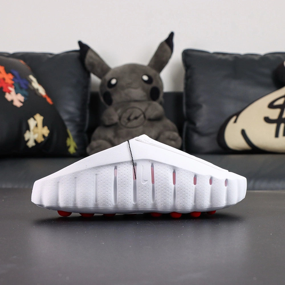 Mind 001 Mule White Speed Red 2026 - Side profile black Swoosh with Pikachu backdrop