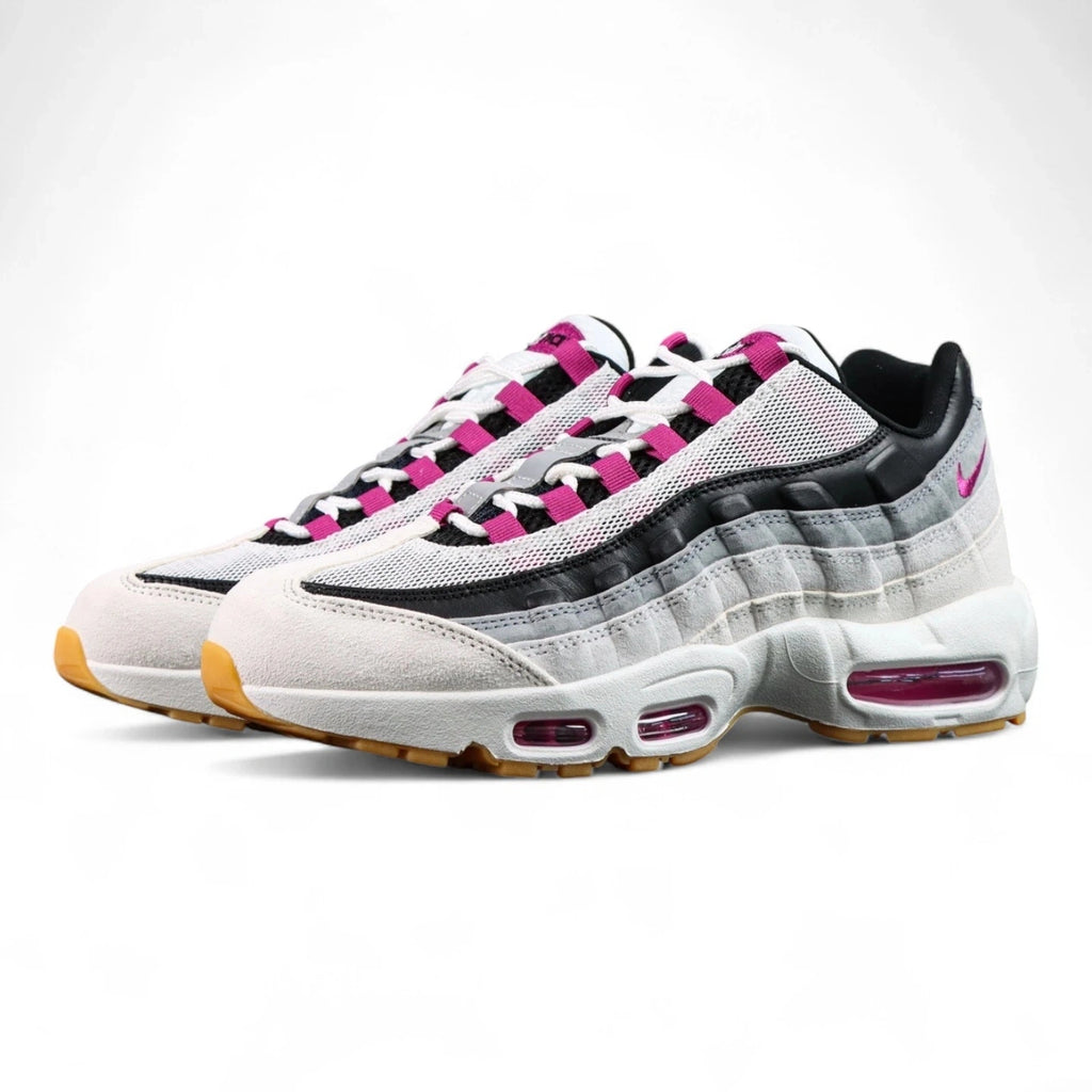 SB x Air Max 95 Cactus Flower - Three-Quarter Lateral View with Purple Shoebox on Grey Background Showing White Suede Toe Box Light Grey Suede Overlays Black Leather Spine Overlays and Honey Gum Outsole